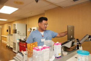 Symphony Aria nurse working at computer