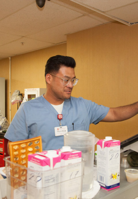 Symphony Aria nurse working at computer